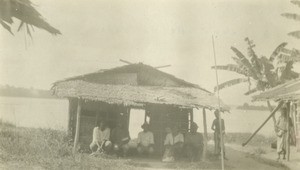 Gabonese in a hut, in Gabon