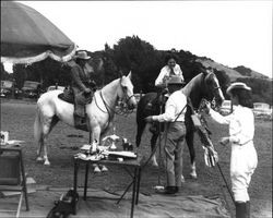 Verde Devencenzi of the California Centaurs mounted junior drill team receiving a trophy from Warren Richardson at the Wikiup Horse Show on the Wikiup Ranch near Santa Rosa, California in 1946