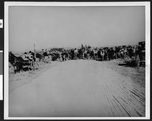 Bicyclists and buggies in the country, ca.1904