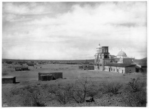 Mission San Xavier del Bac, showing small Indian structures, Tucson, Arizona, ca.1898-1900