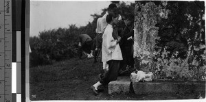 Christians kneel in prayer at Xaviers tomb, Sancian Island, China, ca. 1927