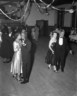 Couples dancing on dance floor