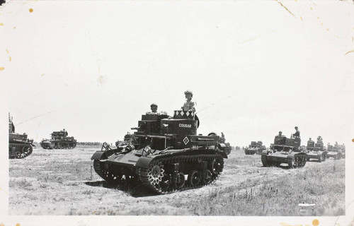Photographic postcard of manned tanks