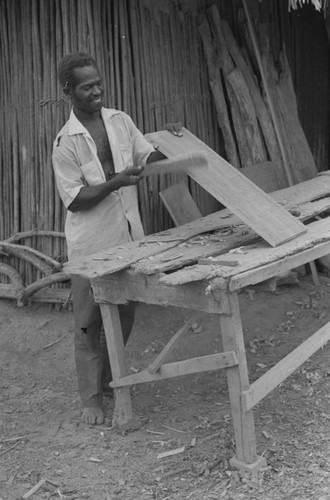 Man working at a construction table, San Basilio de Palenque, 1977