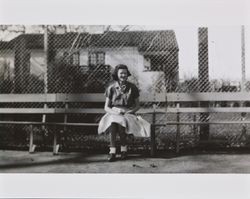 Mary Margaret Thompson sitting on a bench, Santa Rosa, California, about 1941