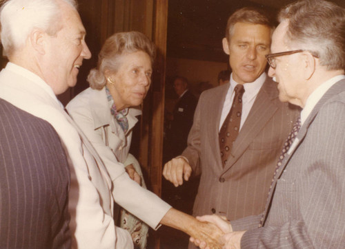 President Banowsky and Justice Harry A. Blackmun greeting two guests (Color)