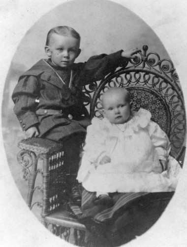 Two children in a chair