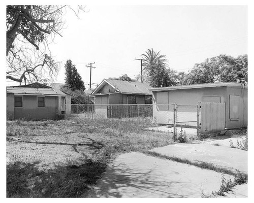 View from north lot facing southeast of 1949 High Place (residence foreground) 1955 High Place, and 1955 1/2 High Place (background), Santa Monica, Calif., July 2009