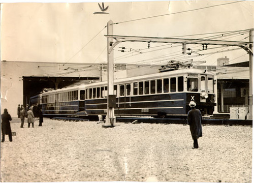 [First electric train to cross the Bay Bridge arriving in San Francisco from Oakland]