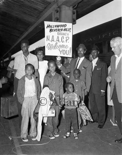 NAACP members welcoming a displaced Louisiana family, Los Angeles, 1962