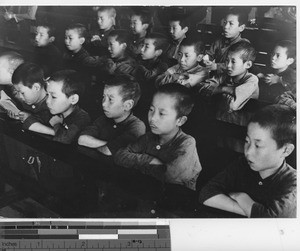 Boys at Mass at Fushun, China, 1939