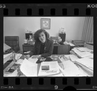 Rose Ochi, executive assistant to Mayor Tom Bradley, at her desk in Los Angeles City Hall, Calif., 1986