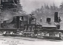 Train locomotive and engineer, circa 1916