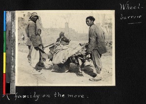 Family moving belongings on cart, Shaanxi, China, ca. 1900