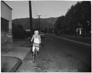 Bicycling grandmother, 1953