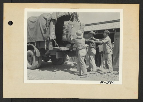 Poston, Ariz.--(Site 1)--Safe arrives for the post office at this War Relocation Authority center for evacuees of Japanese ancestry. Photographer: Clark, Fred Poston, Arizona
