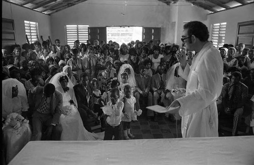 Priest celebrates multiple weddings, San Basilio de Palenque, 1975