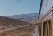 [Shots from passenger train through desert and San Francisco Bay Area]