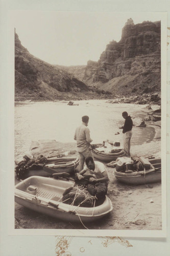 The do-it-yourself Sportyak fleet of four units beached for camp in The Big Drop between Rapids 22 and 23. Rapid 23 in the middle distance is gaining the name Satans Gut. The camp is location of Kolb brothers' camp of 1911, Oct. 27-30