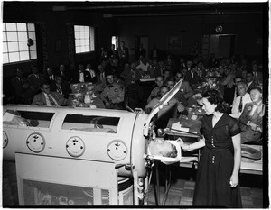 Iron lung patient talks to Rotary Club, 1951