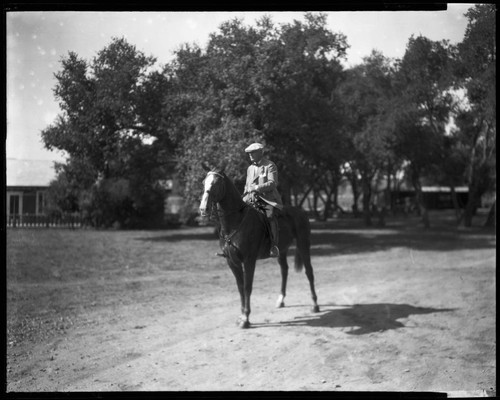 Senator Frank P. Flint on a horse. 1925