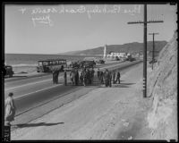 Judge and jury examine an automobile crash site on the Pacific Coast Highway, Los Angeles, 1935