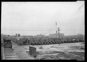 Fleet of trucks in front of building, Pacific-Southwest Warehouse Co., Los Angeles, CA, 1926