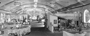 Panoramic view of a tent of displays of products from California Counties at the Los Angeles County Fair in Pomona, ca.1930-1935