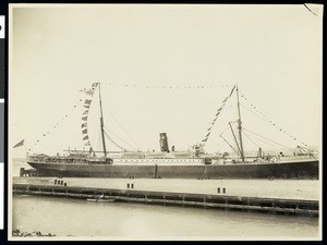 A side view of the S.S. Ohio, during the Los Angeles Chamber of Commerce's voyage, moored in Honolulu, Hawaii, 1907