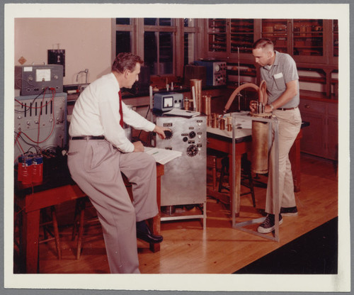 Dean John Drahmann with student in Physics Lab in Montgomery Laboratories, ca. 1963