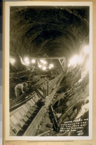 Hoover Dam. May 1932. Laying forms for concrete in one of the four diversion tunnels, Hoover Dam. Oakes