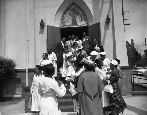 Men and women exit church building, Los Angeles, ca. 1960