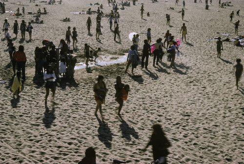 People on the beach near Santa Monica Pier