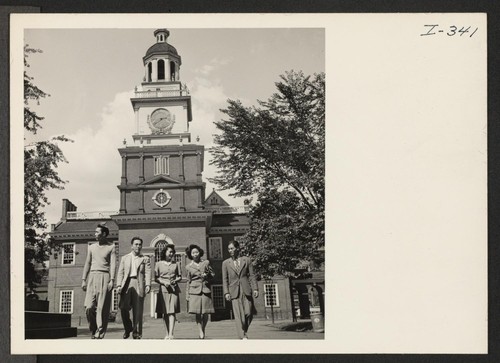 These four Nisei, now living in Philadelphia, Pennsylvania, have just seen the famous Liberty Bell in Independence Hall. From left