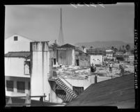 Workmen razing old Warner Bros. studio on Sunset Blvd. in Los Angeles, Calif., 1955