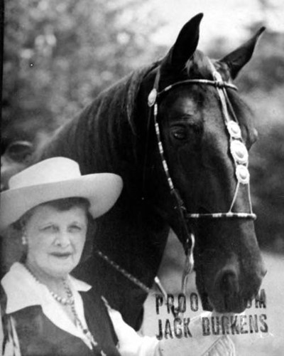 Portrait of Christine Sterling and horse