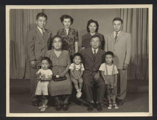 Ronald and Douglas Kubo pose with their families