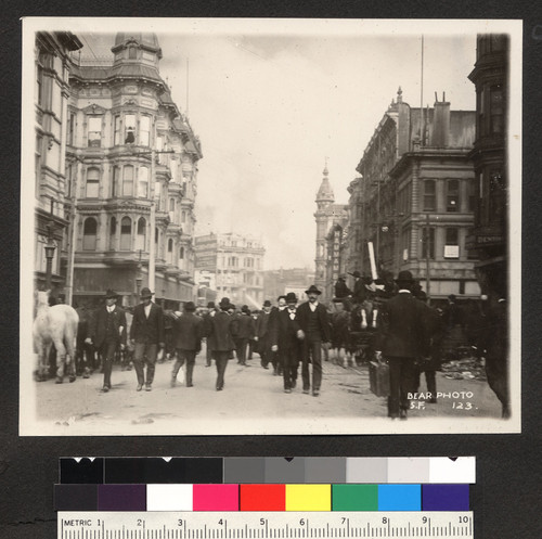 [View down Grant St. toward Market with fire in distance.]