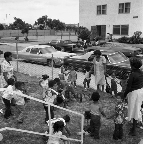 Children on lawn, Los Angeles, 1982