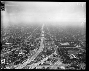 Air views of Harbor Freeway at 42nd Street South, 1957
