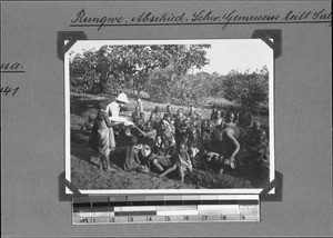 Mathilde Gemuseus distributes salt to the congregation, Rungwe, Tanzania, 1931