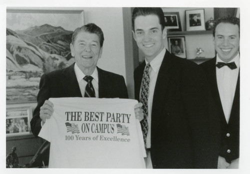 President Reagan with a T-shirt: "The Best Party on Campus"