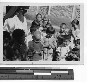 Sr. Richard with orphans at Luoding, China, 1945