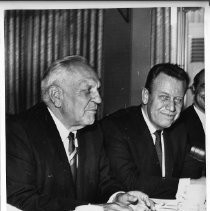 Goodwin Knight, Governor of California from 1953-1959, at a banquet with unidentified man
