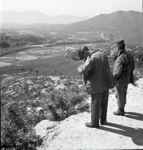 Two servicemen enjoying a view of the Korean landscape