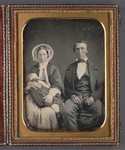 [Morgan and Louisa Belt Fine with child]
