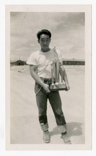 Man holding trophy at Heart Mountain