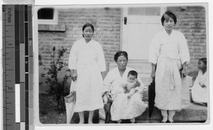 Women and children dressed in white, Yeng You, Korea, 1929