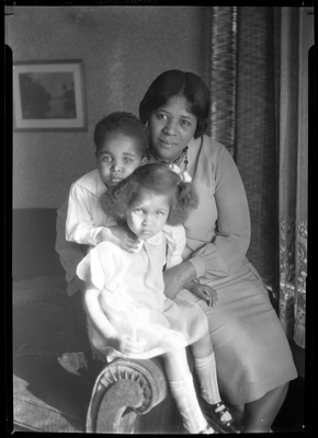 Portrait of woman and two children