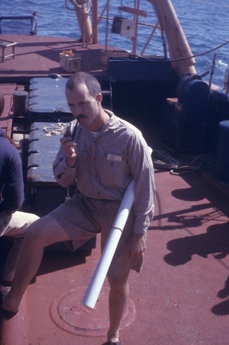 George G. Shor, cruise leader, on board the R/V Spencer F. Baird (ship) during the Scripps Institution of Oceanography Mukluk Expedition (1957) for cores and dredge samples. August 1957